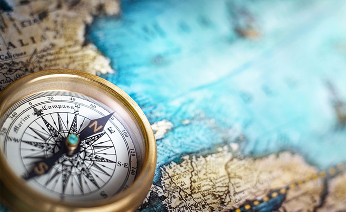 Vastu Shastra — compass on an ancient map